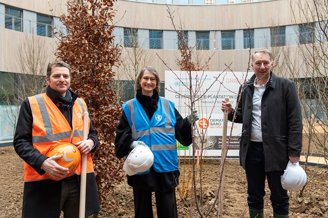 IARC Director Dr Elisabete Weiderpass plants a tree at the Nouveau Centre building - image 3